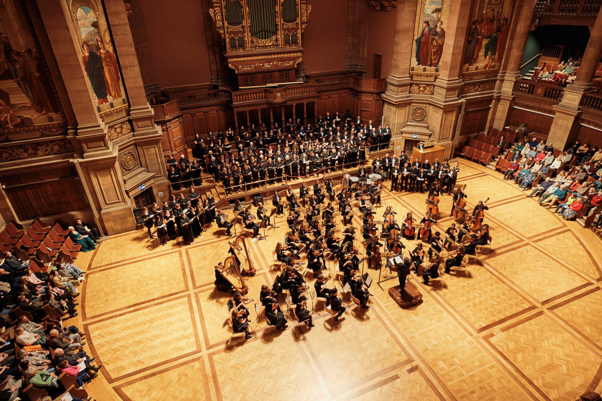 Edinburgh University Music Society's Symphony Orchestra and Chorus perform together in the grand McEwan Hall.